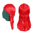 Detail view of red silky durag featuring braided trim and textured satin fabric - Red