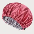 Close-up of adjustable satin hair bonnet showing rose red exterior and silver grey lining - Rose Red And Deep Gray