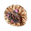 Close-up of satin bonnet featuring champagne gold fabric and floral leopard bow - One Size / Leopard Rose Print Tie Style / Khaki
