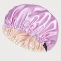 Close-up of double-layer satin sleep bonnet showing purple silk texture and black adjuster - Light Purple and Beige