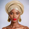 Close-up of metallic gold pleated turban wrap and matching round drop earrings - Beige