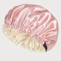 Detail of adjustable black strap on dual-layer satin hair bonnet in pink and champagne - Pale Pink And Beige