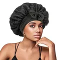 Close-up of black satin sleep cap with floral lace detailing and elegant bow ornament - Black