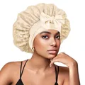 Gros plan du bonnet de nuit en dentelle beige avec détail nœud et ruban élastique - Poche zippée