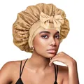 Détail du bonnet de nuit en dentelle doré champagne avec grand nœud et ruban satin - Kaki
