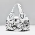 Elegant white leather handbag with floral print and silver hardware detail - White - Ink Gray Floral
