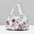 Elegant white tote bag with purple floral print and metallic triangle buckles - White - Ink Pink Floral