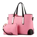Pink crocodile-embossed tote bag with small matching pouch and black accent details - Pink