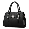 Elegant black handbag with 3D geometric embossing and sweet bow detail for women - Black