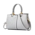 Light grey leather handbag with woven pattern, round handles and gold-tone hardware - Woven Gray