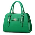 Structured bright green handbag with geometric quilted texture and bow detail - Fruit Green
