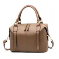 Classic brown leather Boston handbag with gold hardware and adjustable strap on white background - Khaki
