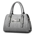 Silver-grey handbag with geometric triangle texture and metallic bow-knot decoration - Gray