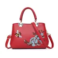 Borsa a mano in pelle rossa con ricamo a fiori e ape e chiusura floreale in argento - Stile 1 (Ricamo Margherita e Ape) / Borgogna