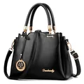 Large black leather tote bag with gold Danbaoly logo and adjustable shoulder strap - Black