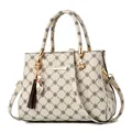 Chic beige tote bag with black clover patterns, gold cat charm and brown tassel pendant - Cream White With Cream White Print