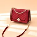 Quilted diamond pattern crossbody bag in burgundy leather with gold chain strap - Burgundy