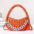 Orange quilted woven handbag with chunky silver chain and adjustable shoulder strap - Orange