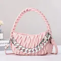 Pink quilted ruffle handbag with woven handle and silver chain accent for women - Pink