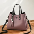 Chic Morandi purple PU leather tote bag with black handles and metal heart charm - Purple