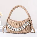 Khaki woven leather shoulder bag with matelasse texture and silver chain link detail - Khaki