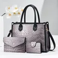 Detailed view of crocodile embossed 3-piece bag set with tote, envelope bag and wallet - Light Gray