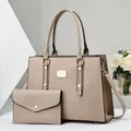 Tweedelige beige handtassenset met bijpassende envelop portemonnee en goudaccent - Khaki