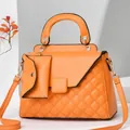 Leuchtend orangefarbene gesteppte Damenhandtasche mit Griff und kleiner Geldbörse - Orange