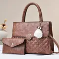 Brown quilted leather tote and clutch set with pearl fur ball charm and gold hardware - Pink