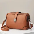 Brown litchi pattern leather crossbody bag with triple zipper pockets and metal clasp - Khaki/Earth Yellow