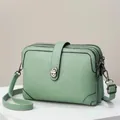 Minimalist mint green multi-zipper crossbody bag with litchi texture and silver lock - Green