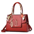 Large red lychee texture handbag with decorative silk scarf and pearl pendant leaf charm - Burgundy