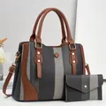 Chic striped woven tote bag with brown faux leather trim and matching envelope wallet - Black