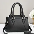Classic black lychee pattern tote bag with gold hardware and adjustable strap - Black