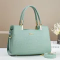 Light green crocodile pattern handbag with gold logo and detachable shoulder strap - Green