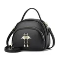 Sweet black pebbled leather crossbody bag with heart clasp and gold chain detail - Black