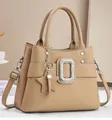 Beige pebble leather tote bag with diamond buckle and star charm detail - Khaki