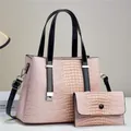 Detail of pink croc-embossed tote bag set with black contrasting handles and silver hardware - Handbag And Clutch (JC-3104#) / Pink