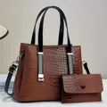 Detail of brown crocodile pattern tote bag set with textured leather and silver hardware - Handbag And Clutch (JC-3104#) / Brown
