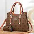 Brown contrast leather tote bag set with floral print and gold hardware details - Earthy Yellow