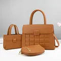 Detailed set of caramel textured leather bags with diamond quilting and chain detail - Earthy Yellow