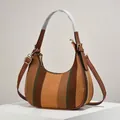 Striped knit hobo bag with brown leather strap and gold hardware on white pedestal - Earth Yellow (Coffee Yellow Green Stripe)