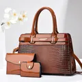 Detailed view of brown 3-piece tote set with glossy patent leather and croc texture - Three-Piece Set / 30cmx11cmx21cm / Earthy Yellow