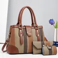 Detailed view of 3-piece brown canvas handbag set with gold buckles and striped texture - Khaki