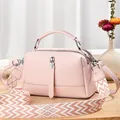 Pink lychee leather pillow bag with stylish bohemian geometric pattern wide strap - Pink