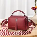 Dark red litchi texture pillow bag with patterned wide strap and silver hardware - Wine Red