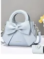 Elegant light blue handbag with large bow decoration and matching small wallet - Blue Handbag With Wallet / Blue