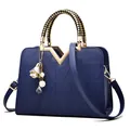 Sac à main bleu marine structuré avec gaufrage géométrique et anses tressées - Bleu saphir
