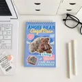 Detail van lichtblauwe spiraal weekplanner met Angel Bear-motief op een bureau - Wekelijkse Planning - Beer