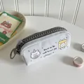 Dettaglio dell'astuccio in tela grigia con cerniera grande e simpatico gatto - Grigio